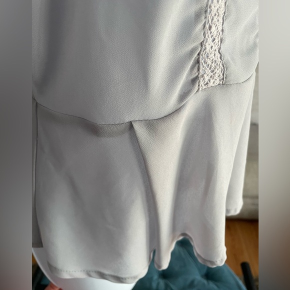 Finn&Clover Grey Sleeveless PePlum Top with Button Closure in Back - Picture 8 of 8